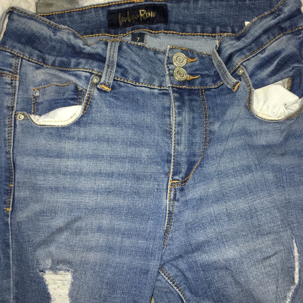 Light blue rip jeans